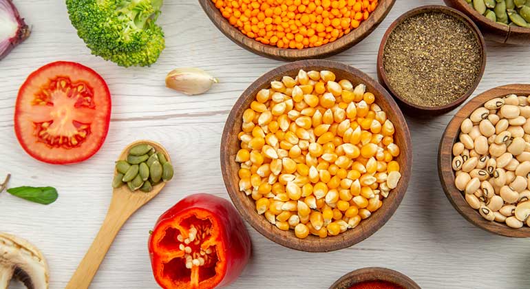 top-view-wooden-bowls-with-corn-seeds1